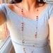 Red , Golden, and Bronze long necklace