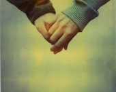 Polaroid photograph of two hands in love - fine art print of 6x6