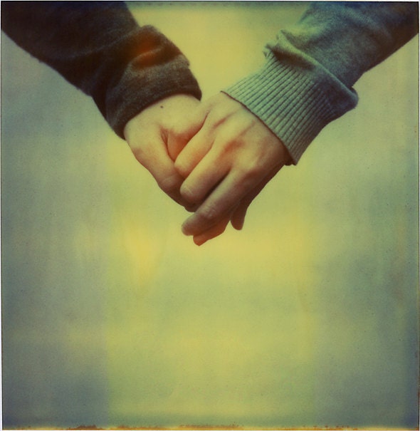 Polaroid photograph of two hands in love - fine art print of 6x6