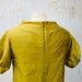 Mustard Yellow Dress in Silk with raised neckline and puffy sleeves