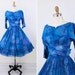 r e s e r v e d - vintage 50s 60s dress // Blue and Purple Watercolor Floral Party Dress with Sheer Overlay and Side Bow
