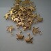 36 tiny brass dove charms