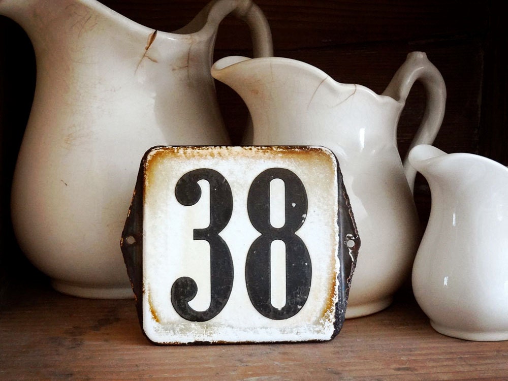 vintage enamel house number from Europe, number 38 black on white