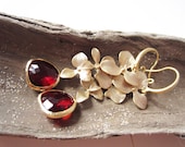 Red flower earrings.  Gold long dangle earrings.  Orchid earrings.