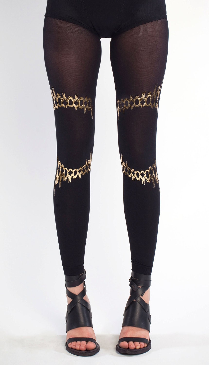 NEW--- Solaris, gold on black leggings, one size the Harmony collection
