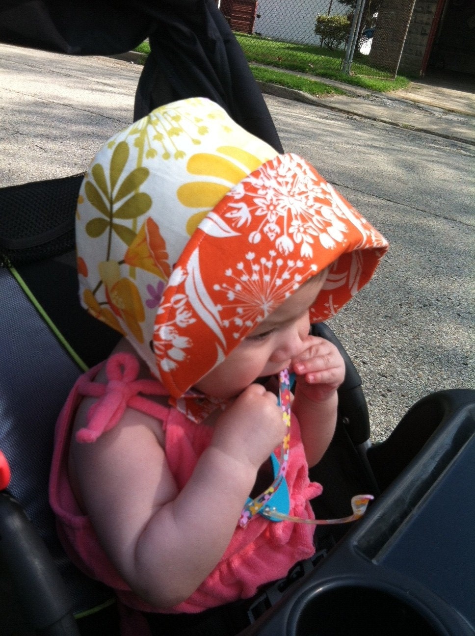 The Tropicana Bonnet, new for Summer 2012, a reversible bonnet in warm yellows and oranges