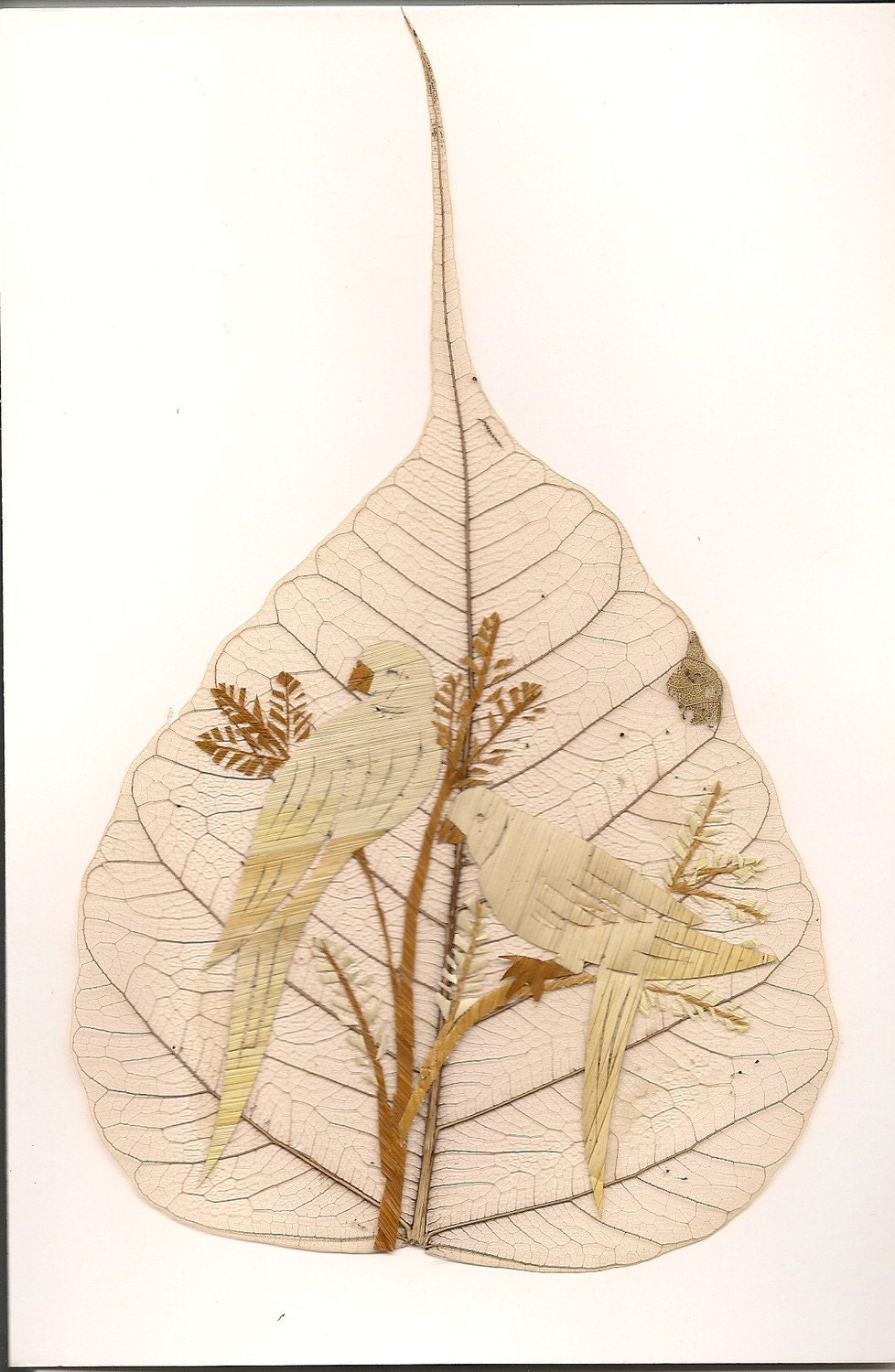 Made in USA, Handmade with dried leaves.  Parrots on a real leaf. No two leaves alike Unique gift