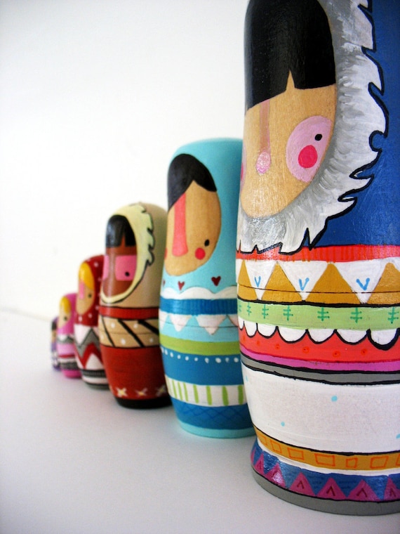 handmade wood folk art nesting dolls... wool sweater Eskimos