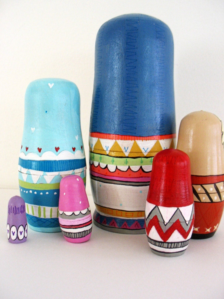 handmade wood folk art nesting dolls... wool sweater Eskimos