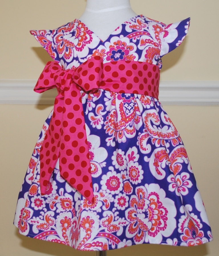 Kyoko style dress in Jennifer Pagnelli print with flutter sleeves and beautiful bow sash