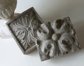 two cement architectural brick details