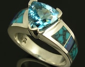 Australian opal and turquoise sterling silver ring with a 2.25ct. trillion cut blue topaz.