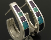 Sterling silver earrings inlaid with sugilite and Australian opal by Mark Hileman.