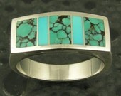 Turquoise and spiderweb turquoise sterling silver ring by Hileman.
