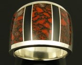 Red dinosaur bone and black onyx inlaid in sterling silver wide ring band by Mark Hileman.