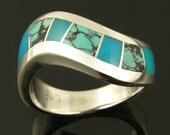 Sterling silver ring with spiderweb turquoise and gem silica inlay by Hileman