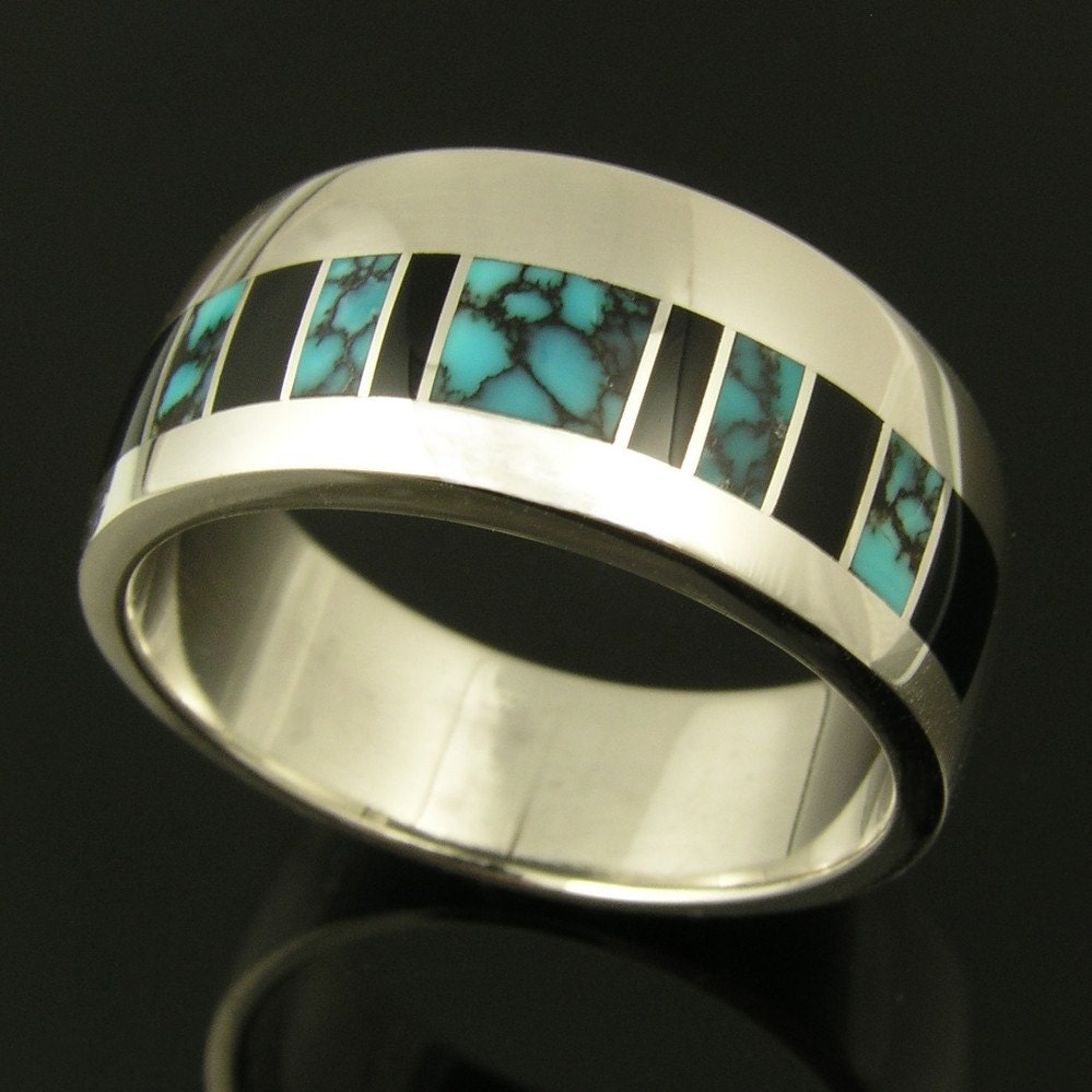 Man's sterling silver ring inlaid with black onyx and spiderweb turquoise.