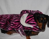 Pink and Black Zebra Print lined with Sherling (removeable hood) comes in 5 sizes xxxsmall to edium laerger ones custom