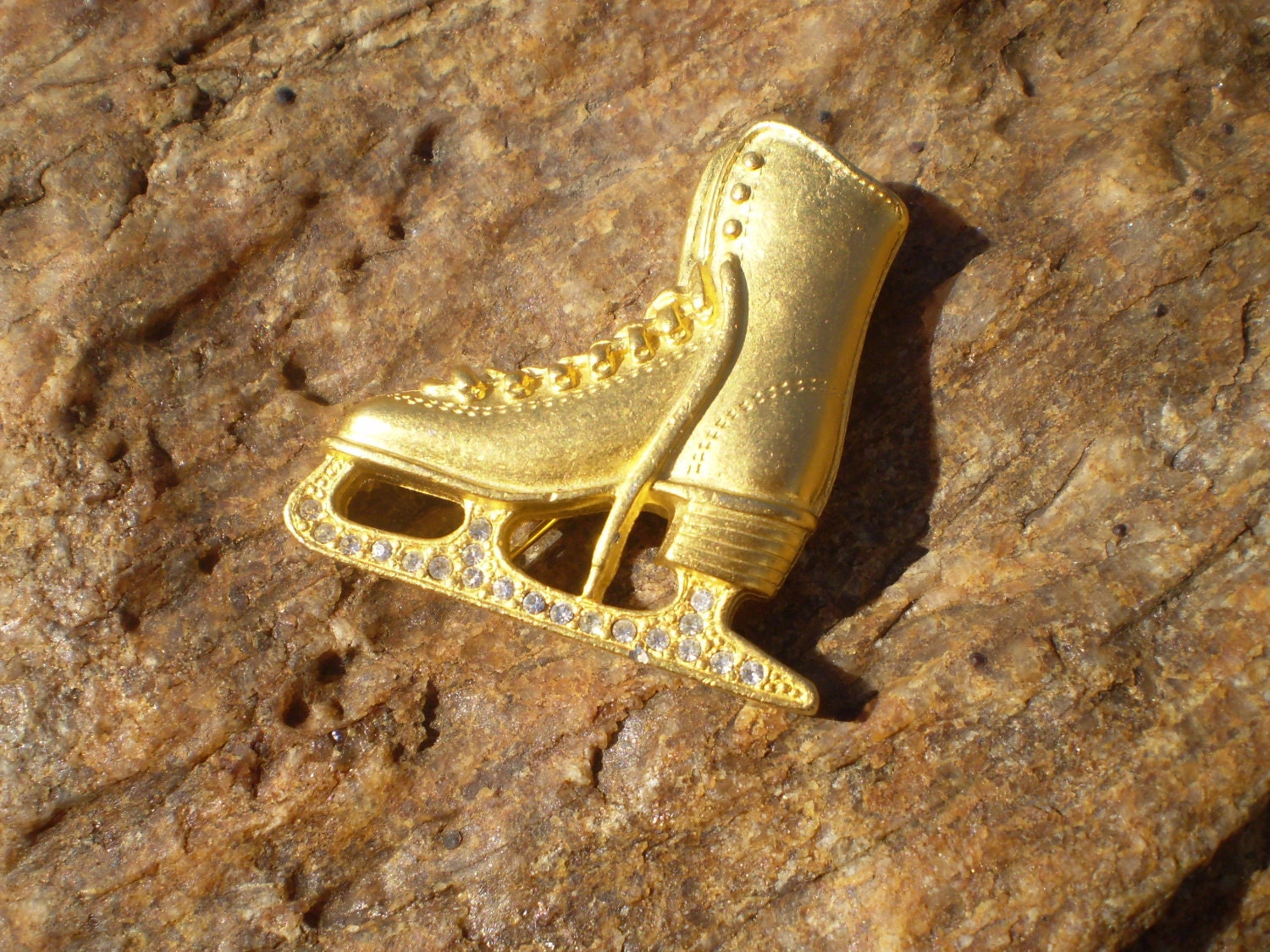 Bogo sale - Vintage gold tone and rhinestone ice skate brooch