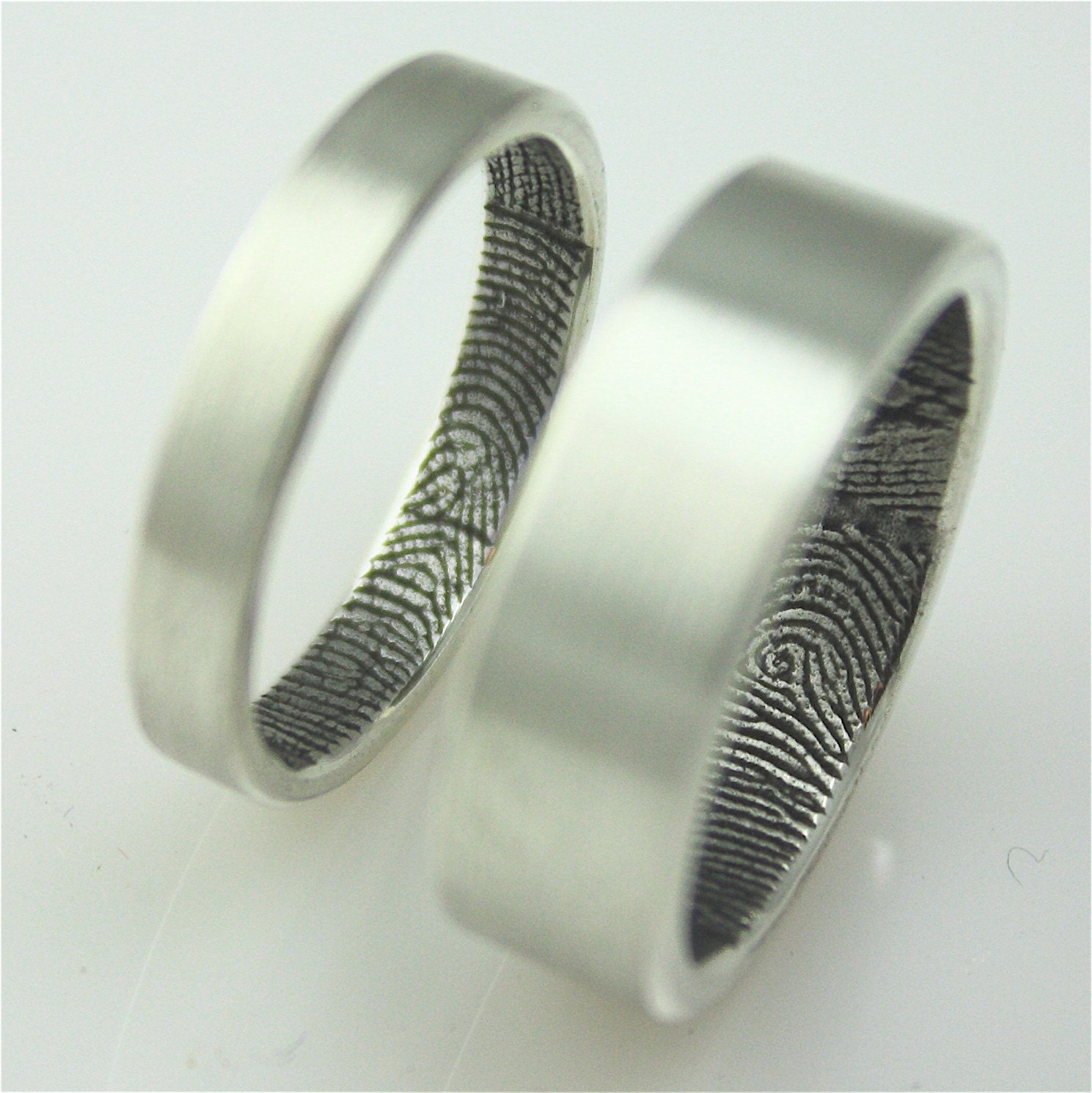 Custom fingerprint wedding bands in sterling silver (set of two)