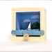 white sailboat island scene sailboat automaton