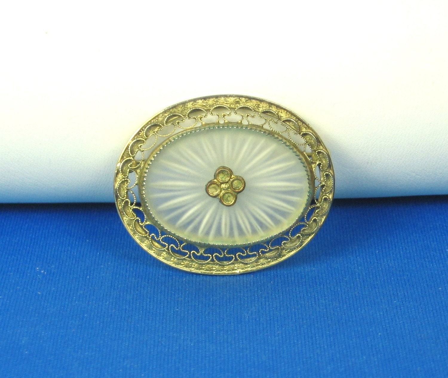 Gold Tone Filigree Metal and Camphor Glass Brooch