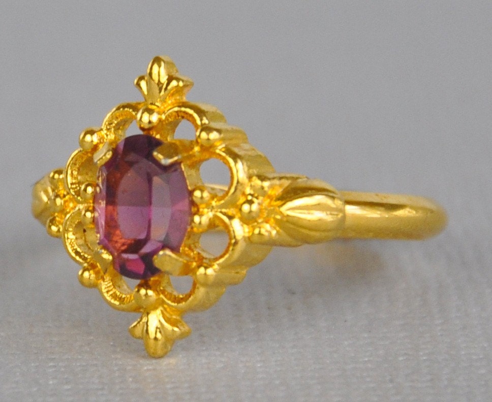 Sale At Vntg Prices-1977 Avon Gold Tone Filigree with Amethyst Rhinestone Venetian Lace Costume Jewelry Ring Size 9.5