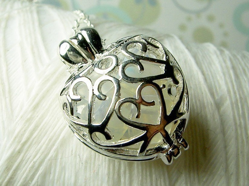 Worry Locket - opal gemstones in filigree heart locket and sterling silver necklace