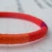 COOPER bracelet - textile and leather with metal button (persimmon wildberry kumquat)
