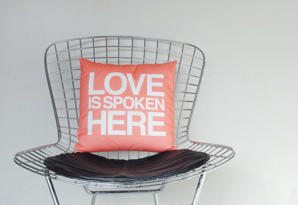 Love is Spoken Here 14"x14" pillow in coral pink