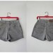 RESERVED SALE 90s M Lee Riveted high waisted gold studded olive denim shorts
