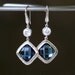 Faceted Sapphire Blue Crystal and Silver Dangle Earrings