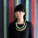 The Clemence woven rope necklace in spring green / black