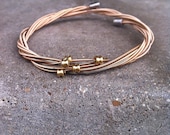 Recycled Guitar Strings - Restored Guitar String Salmon Color SLIM Bracelet