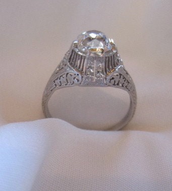 SALE Circa 1900 .85 Carat Mine Cut Diamond and Platinum Engagement Ring.