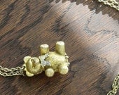 Golden Teddy Bear Spring-Hinged Locket
