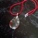 African Bloodstone Teardrop Pendant Necklace with Sterling Silver Leaf Bail on Red Satin Cord