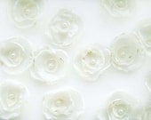 ivory silk fabric flowers for scattering on your wedding reception tables x 10