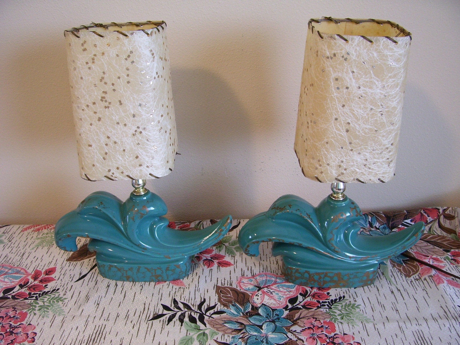 Pair of Mid Century Deco Spray Swirled Wave Shaped Base Turquoise Lamps with Fiberglass Shades