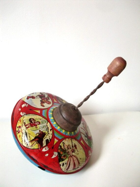 SPIN AROUND. French antique. Metal. Fairy tale illustrations.