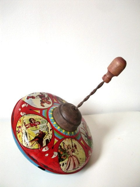 SPIN AROUND. French antique. Metal. Fairy tale illustrations.