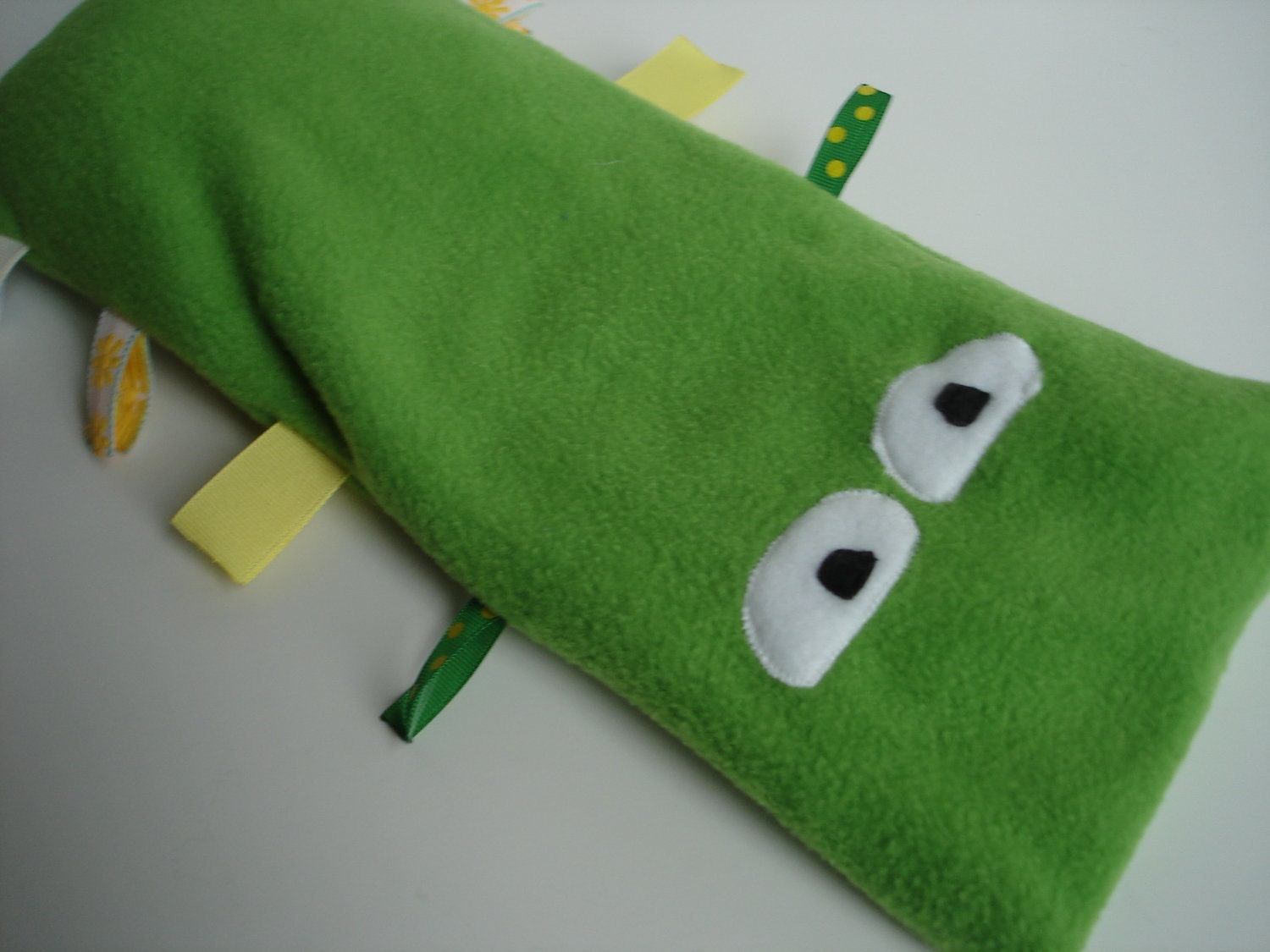 Small green weighted caterpillar lap pad - 1 pound