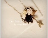 Les Fleurs necklace made with vintage style roses, eiffel tower charm, fresh water pearl etc.