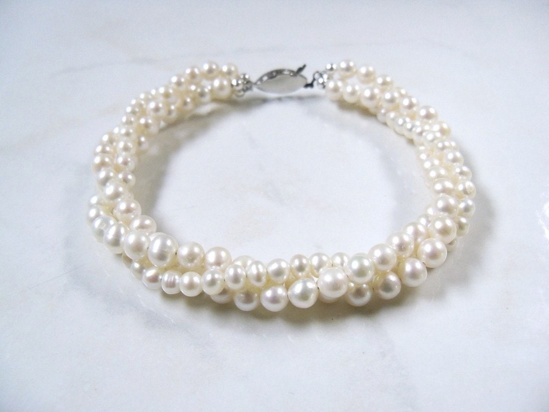 Twisted pearl bracelet White freshwater pearl twisted bracelet multi strand with antiqued silver clasp