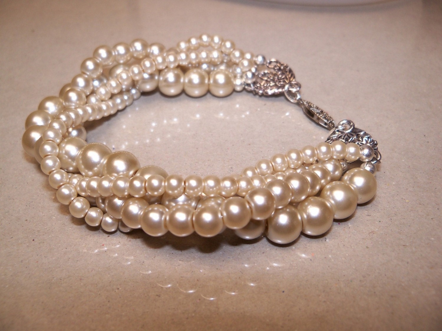 Twisted pearl bracelet Creamy beige glass pearl multi strand twisted bracelet with antiqued silver clasp other colors available