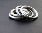 Set of 4 silver stacking rings custom made per order in any size, 3 rings are plain while one is hammered and oxidized - "Cuatro Rings"