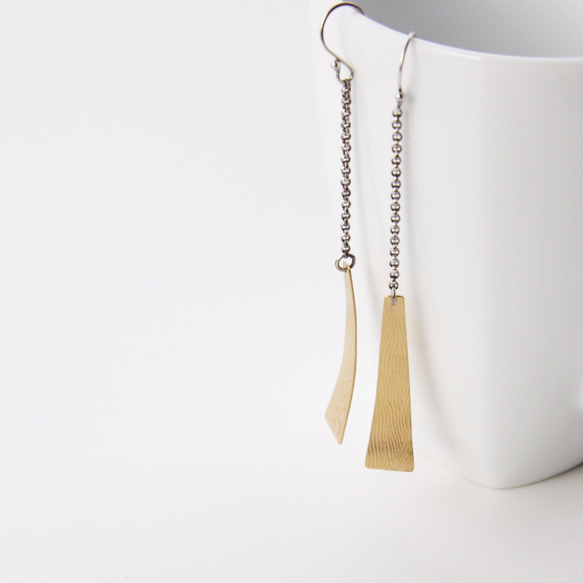 Lightweight and modern earrings with a fluted and patterned brass shape dangling off rolo chain and handmade earwires - "Release Earrings"