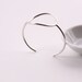 Minimalist silver bracelet of a focal circle shape forged, soldered and hand formed into comfortable, elegant wrist jewelry - "Centre Cuff"