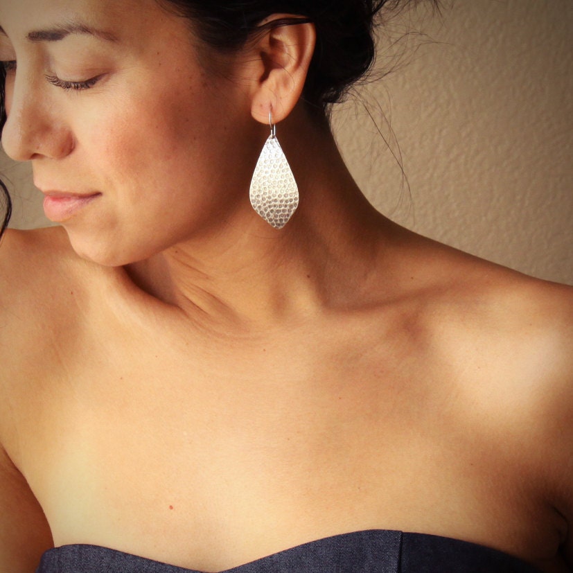 Handmade sterling silver earrings with a streamlined yet unique outer leaf shape and a distinctive hammered pattern - "La Hoja Earrings"