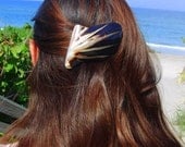 Black and gold shell barrette